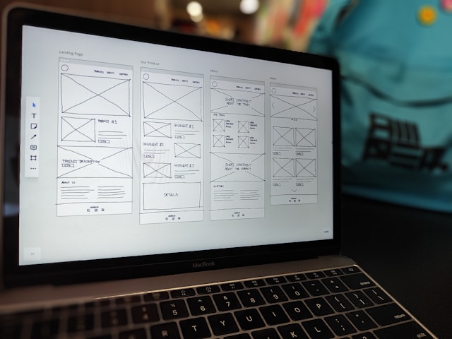 Laptop open with wireframes displaying on the screen.